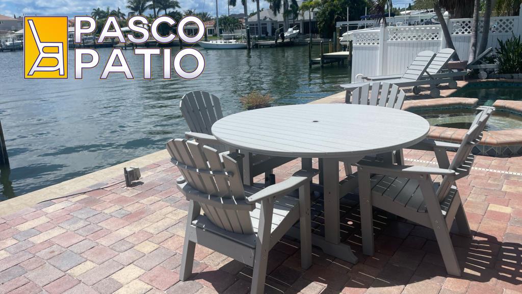 Stylish and durable 6-piece outdoor dining set with a weatherproof table and matching chairs by Pasco Patio